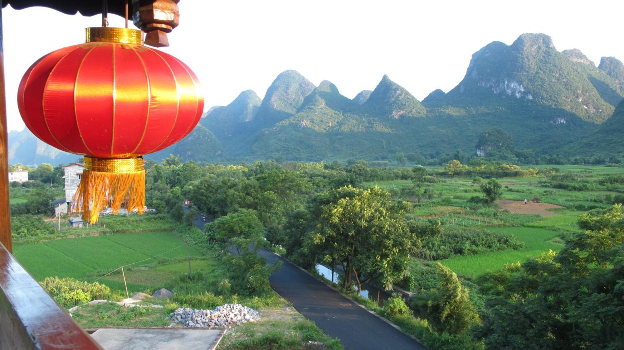 Yangshuo Tea Cozy--One Way Free Pick Up From Airport Or Ts 4 Nights Vendégház Kültér fotó